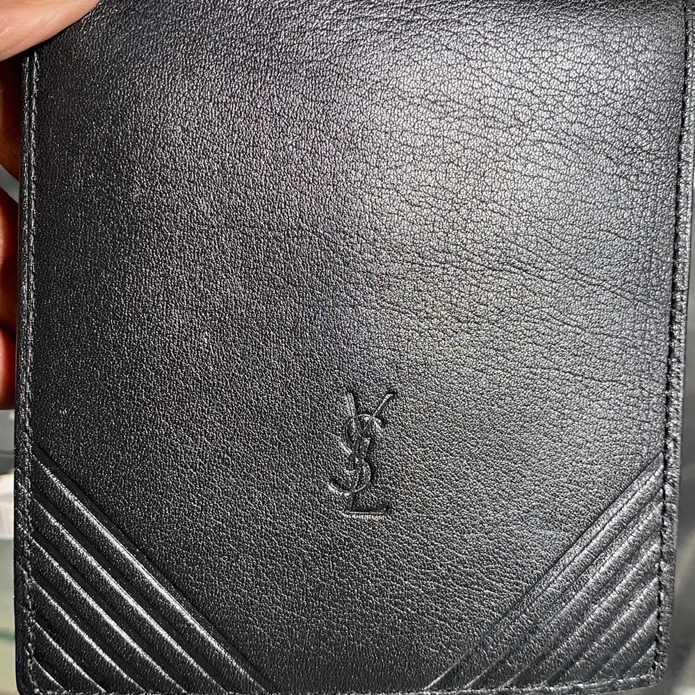 Authentic YSL Sleek black leather bifold wallet